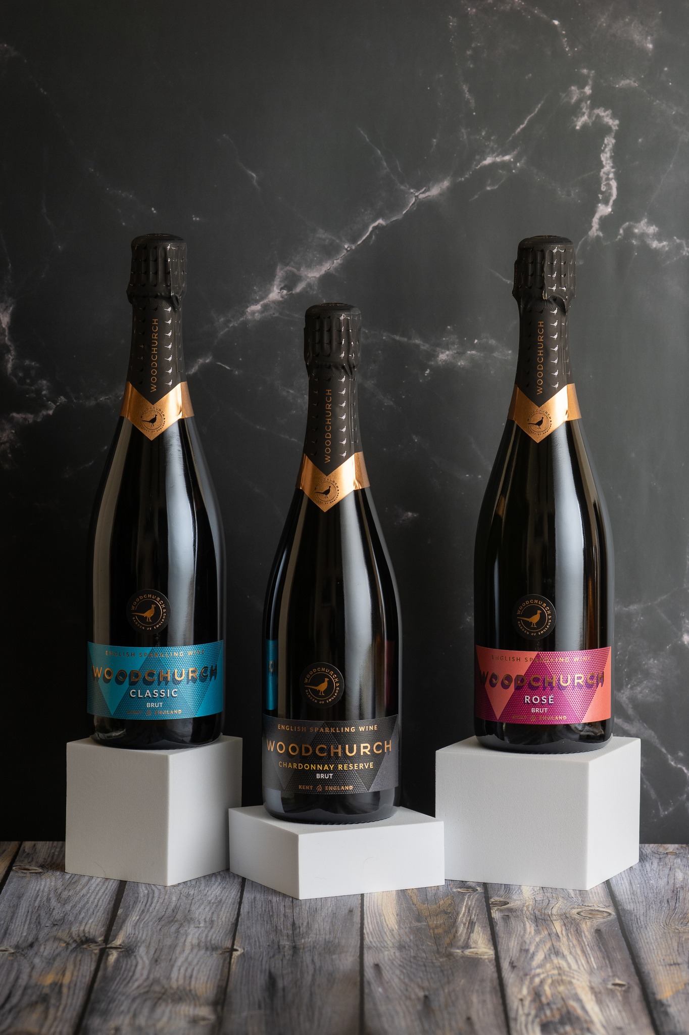 Three bottles of Woodchurch English wine